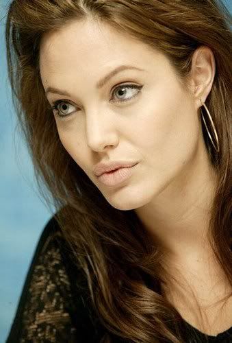 angelina jolie hairstyles with bangs. Angelina Jolie#39;s face does not